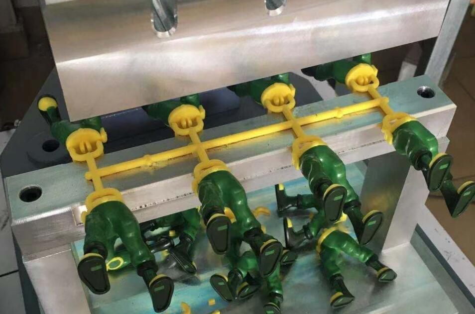 O princípio da remoção automática ultrassônica da porta de cola e o método de design da porta de cola